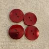 boutons rouges brillants