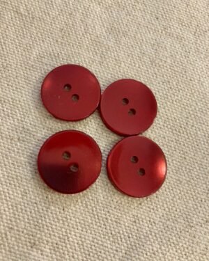 boutons rouges brillants