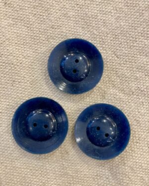 boutons vintages à relief bleu de prusse